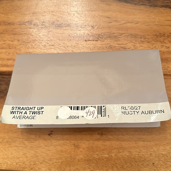 Raquel Welch Straight up with a twist wig. - Picture 9 of 9